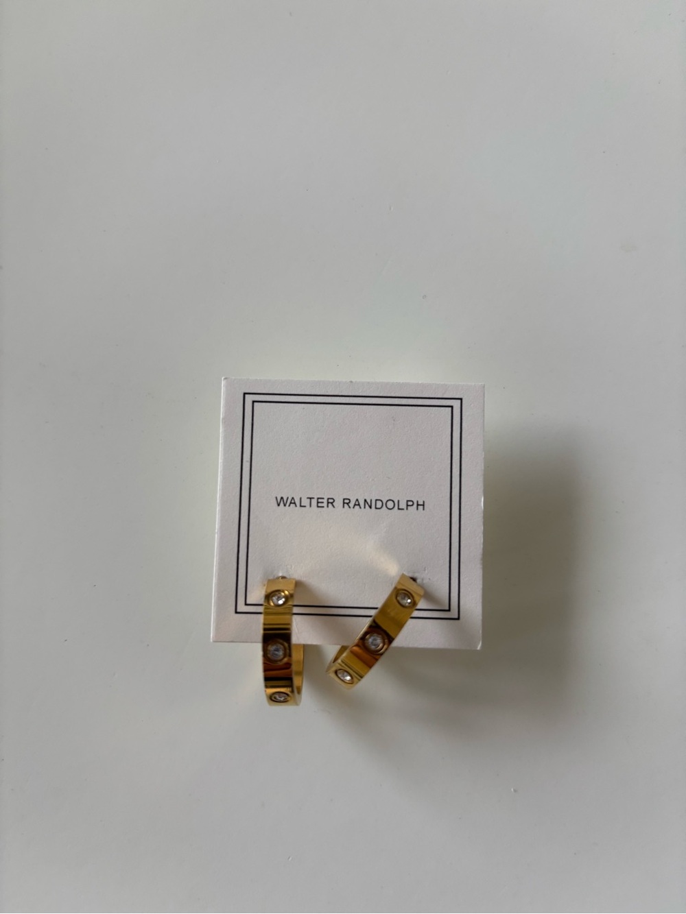 Gold Hoop Earrings with Crystal Details